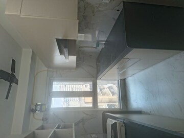 Kitchen in 1.5 BHK Apartment at Deraiya Iconico, Kurla East – for Rent