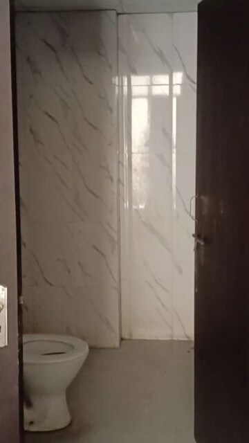 Bathroom in 1 BHK Apartment at Raj Nagar – for Sale