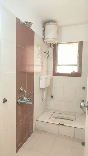 Bathroom in 3 BHK Apartment at Pimple Saudagar – for Rent