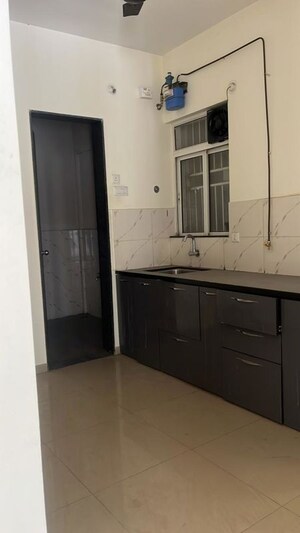 Kitchen in 2 BHK Apartment at Kolte Patil Life Republic 16th Avenue Arezo, Hinjewadi – for Sale