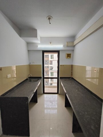 Kitchen in 2.5 BHK Apartment at Lodha Palava City Lakeshore Greens, Dombivli East – for Rent