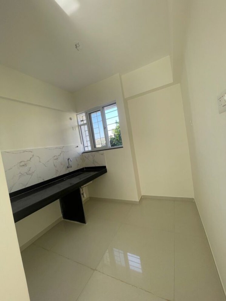 Kitchen, blue-27th-avenue 2 Bedroom 1000 Sq.Ft. Apartment In Bavdhan Pune 9728198