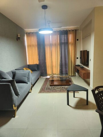 Living Room in 2 BHK Apartment at Jaypee Greens Pavilion Court, Sector 128 – for Rent