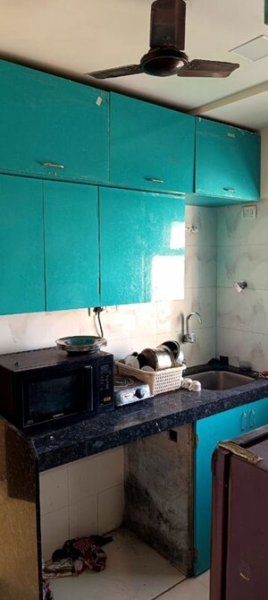 Kitchen in 2 BHK Apartment at Newtech Shastri Nagar, Goregaon West – for Rent