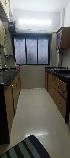 Kitchen in 2 BHK Apartment at Kamlesh Apartment, Andheri East – for Rent
