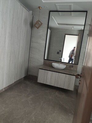 Bathroom in 4 BHK Apartment at Mahagun Mezzaria, Sector 78 – for Rent