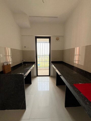 Kitchen in 1 BHK Apartment at Lodha Palava Downtown, Dombivli East – for Rent