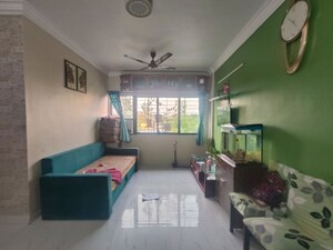 Living Room in 3 BHK Apartment at Mittal Tower CHS, Kopar Khairane – for Sale