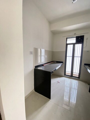 Kitchen in 1.5 BHK Apartment at Runwal My City, Dombivli East – for Sale