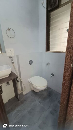 Bathroom in 2 BHK Apartment at Asmita Sand Dunes, Malad West – for Rent