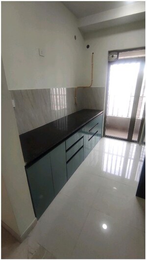 Kitchen in 2 BHK Apartment at Kalpataru Paramount, Kapur Bawdi – for Rent