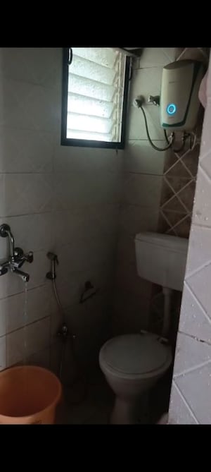 Bathroom in 1 BHK Apartment at Hiraco Eminence, Mira Road – for Rent
