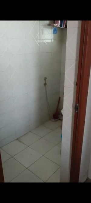 Bathroom in 1 BHK Apartment at Hiraco Eminence, Mira Road – for Rent