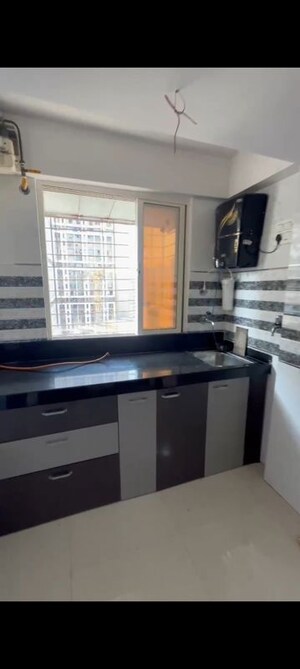 Kitchen in 1 BHK Apartment at Seven Apna Ghar Phase 2 Plot A, Mira Road – for Rent