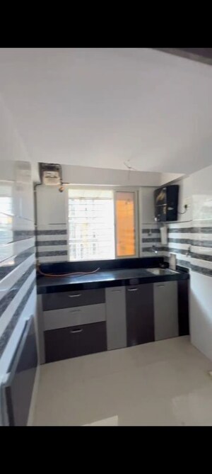Kitchen in 1 BHK Apartment at Seven Apna Ghar Phase 2 Plot A, Mira Road – for Rent