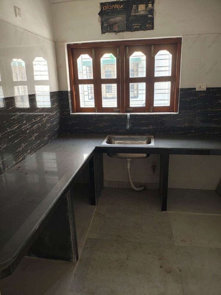 Kitchen, new town 3 Bedroom 1479 Sq.Ft. Apartment In New Town Kolkata 9729240