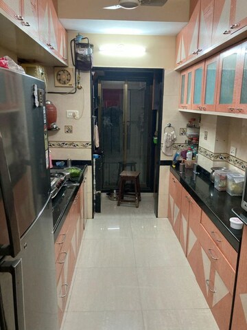 Kitchen in 2 BHK Apartment at Harshail Flamingo Apartments, Malad West – for Rent