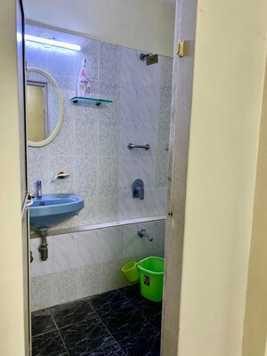 Bathroom in 3 BHK Apartment at Goregaon West View CHS, Goregaon West – for Rent