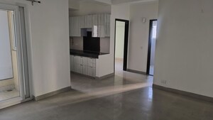 Room in 2 BHK Apartment at Paramount Floraville, Sector 137 – for Rent