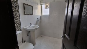 Bathroom in 2 BHK Apartment at Paramount Floraville, Sector 137 – for Rent