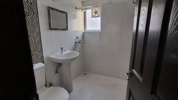 Bathroom in 2 BHK Apartment at Paramount Floraville, Sector 137 – for Rent