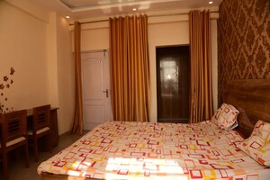 Bedroom in 3 BHK Apartment at Ansal API Celebrity Gardens, Sushant Golf City – for Rent