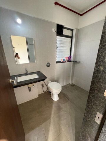 Bathroom in 2 BHK Apartment at Gera Adara, Hinjewadi – for Sale
