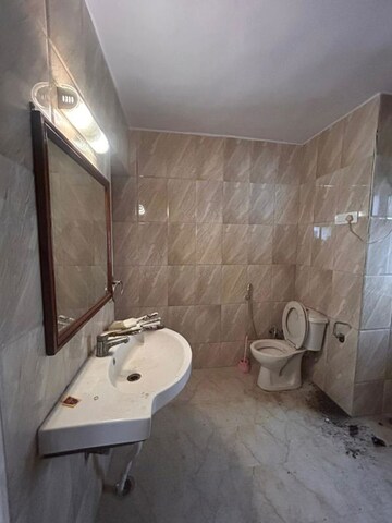 Bathroom in 2 BHK Apartment at Khirki Extension – for Rent