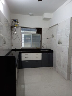 Kitchen in 1 BHK Apartment at Rajhans Society, Goregaon East – for Rent