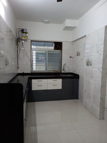 Kitchen in 1 BHK Apartment at Rajhans Society, Goregaon East – for Rent