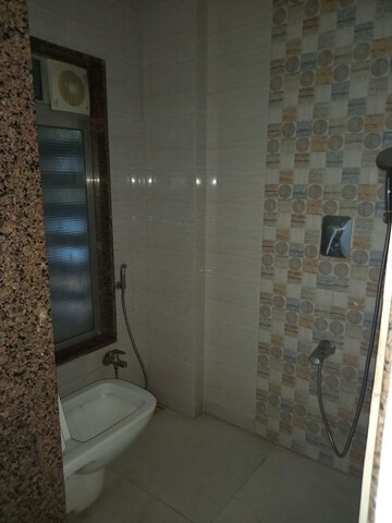 Bathroom in 1 BHK Apartment at Rajhans Society, Goregaon East – for Rent