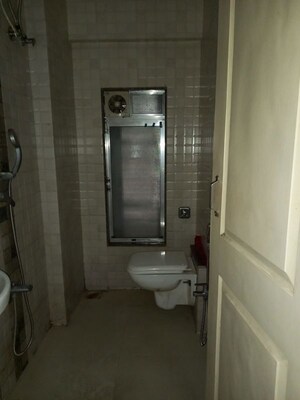Bathroom in 1 BHK Apartment at Rajhans Society, Goregaon East – for Rent