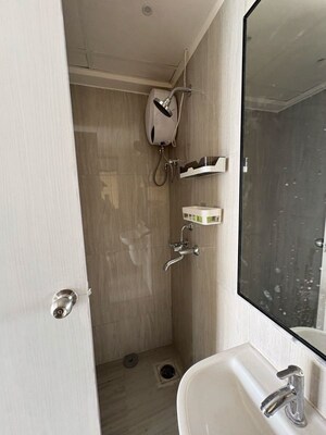 Bathroom in 1 BHK Apartment at Runwal Gardens Phase 3, Kalyan Shilphata Road – for Rent
