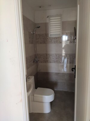 Bathroom in 2 BHK Apartment at Windlass River Valley, Harrawala – for Rent