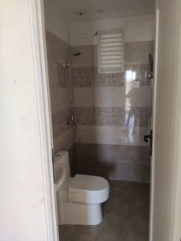 Bathroom in 2 BHK Apartment at Windlass River Valley, Harrawala – for Rent