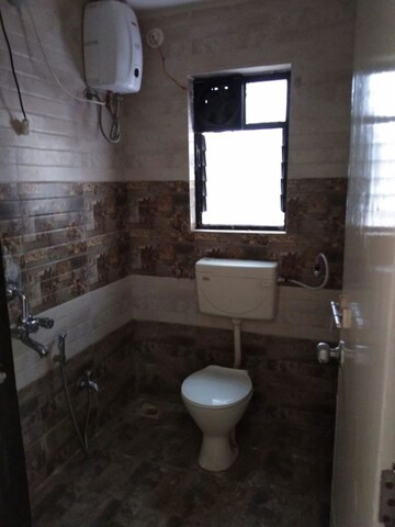 Bathroom in 2 BHK Apartment at Ganeshnagar CHS, Kothrud – for Rent