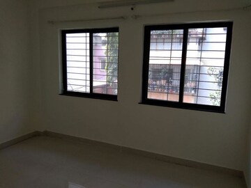 Living Room in 2 BHK Apartment at Ganeshnagar CHS, Kothrud – for Rent