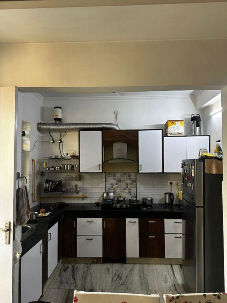 Kitchen, green fields colony 4 Bedroom 200 Sq.Yd. Builder Floor In Green Fields Colony Faridabad 9729756