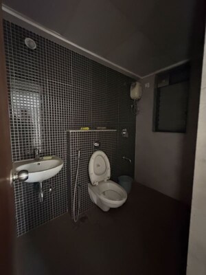 Bathroom in 2 BHK Apartment at Lodha Casa Lagoona, Shilphata – for Rent