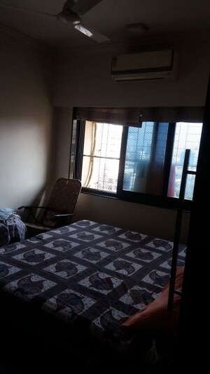 Bedroom in 2 BHK Apartment at K Raheja Palm Spring, Malad West – for Rent