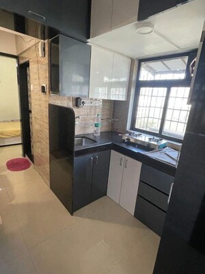 Kitchen in 1 BHK Apartment at Sai Milan CHS, Worli – for Sale