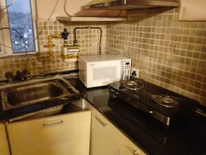 Kitchen in 1 BHK Apartment at Paras Tierea, Sector 137 – for Rent