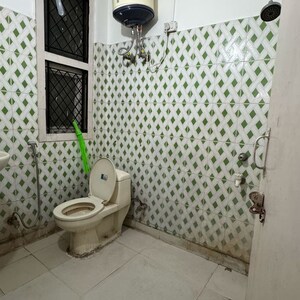 Bathroom in 2 BHK Builder Floor at Chattarpur – for Rent