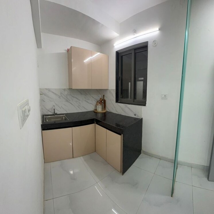 Kitchen, uk-iona 2 Bedroom 552 Sq.Ft. Apartment In Shyam Nagar Mumbai 9730106