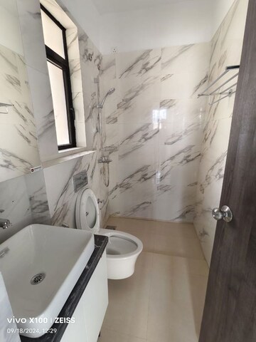 Bathroom in 1 BHK Apartment at Raymond Ten X Vibes, J K Gram – for Rent