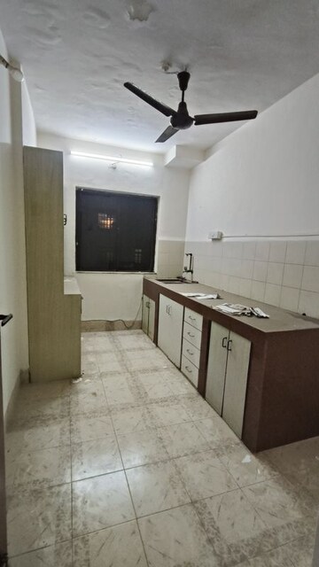 Kitchen in 2 BHK Apartment at Rizvi Heights, Senapati Bapat Marg – for Rent