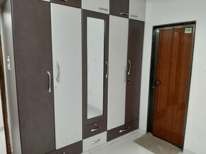 Bedroom in 1 BHK Apartment at Dheeraj Godavari Apartment, Malad West – for Sale