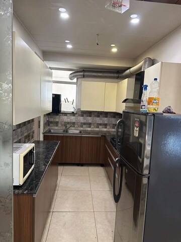 Kitchen in 3 BHK Apartment at Sushma Chandigarh Grande, Lohgarh – for Rent