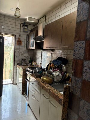 Kitchen in 3 BHK Apartment at New Krishna Tower, Kopar Khairane – for Sale