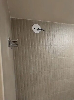 Bathroom in 2 BHK Apartment at Archen Aarvi Apartments, Vasai West – for Sale